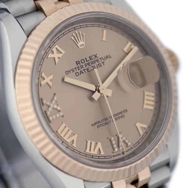 Rolex -126231 -Rose Gold No 6 & 9 Diamonds