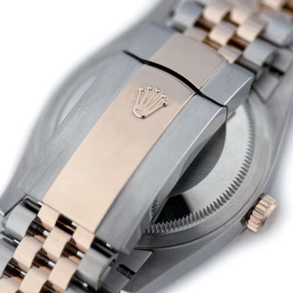Rolex -126231 -Rose Gold No 6 & 9 Diamonds
